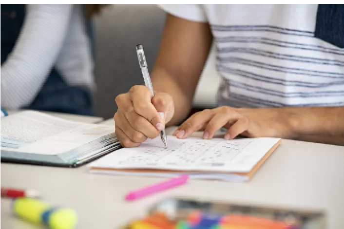 Young person working on education